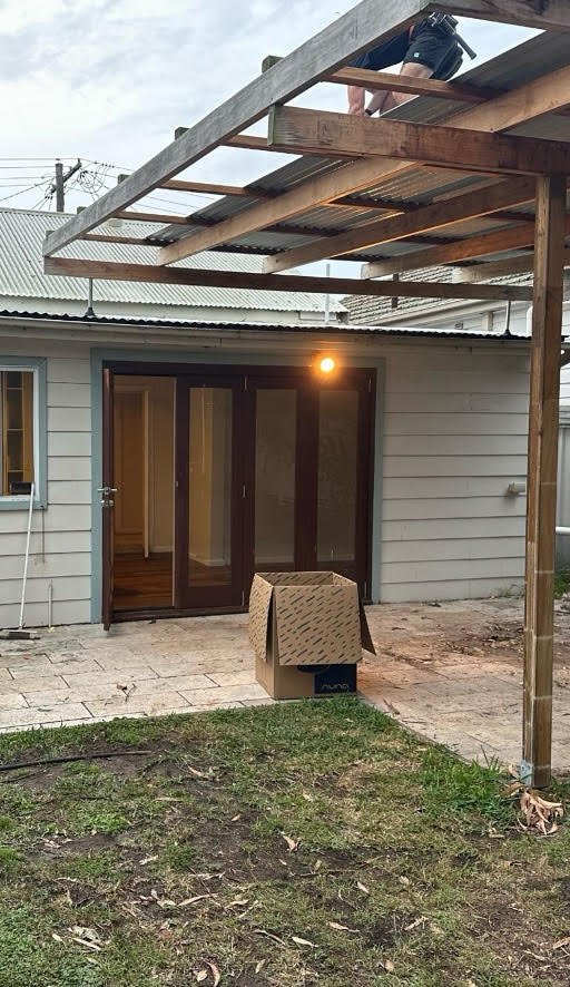 Rear patio and pergola area at Tighes Hill